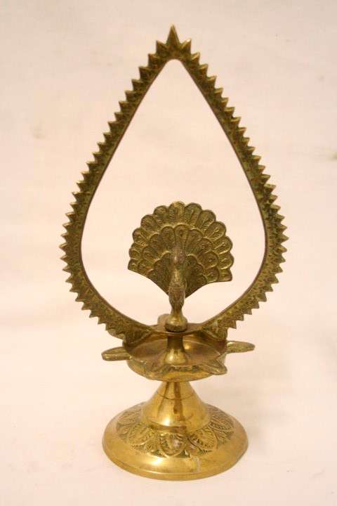 An awesome Indian made solid brass Diya oil lamp with a peacock motif in the centre Lifespace Sale