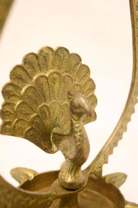 An awesome Indian made solid brass Diya oil lamp with a peacock motif in the centre Lifespace Sale