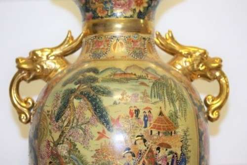 A spectacular and beautifully decorated Japanese Satsuma vase with gold gilt dragon-head handles