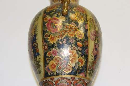 A spectacular and beautifully decorated Japanese Satsuma vase with gold gilt dragon-head handles