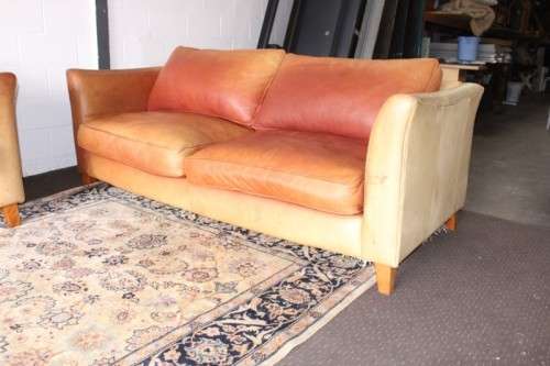 Two stunning and very comfortable large genuine full-grain tan leather couches w/ removable cushions