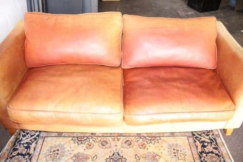 Two stunning and very comfortable large genuine full-grain tan leather couches w/ removable cushions