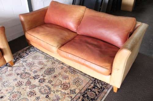 Two stunning and very comfortable large genuine full-grain tan leather couches w/ removable cushions