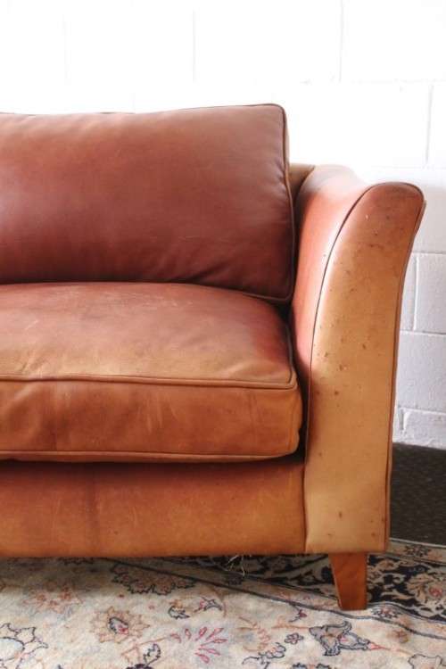 Two stunning and very comfortable large genuine full-grain tan leather couches w/ removable cushions