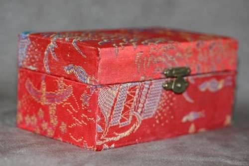 A stunning boxed set of hand painted, scenery themed Chinese cloisonne enamelled Ben-wa balls