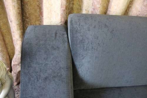 A fantastic ultra modern, "new" extremely well made (195cm long) 2 seater grey upholstered couch.
