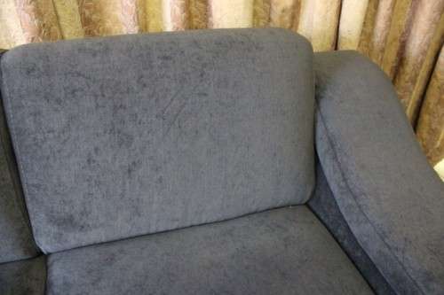 A fantastic ultra modern, "new" extremely well made (195cm long) 2 seater grey upholstered couch.