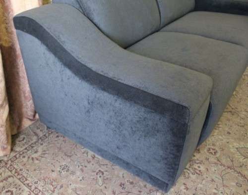 A fantastic ultra modern, "new" extremely well made (195cm long) 2 seater grey upholstered couch.
