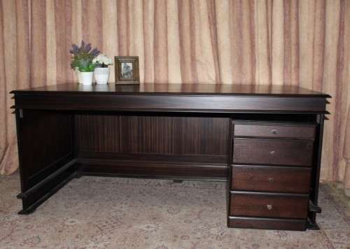 An amazing 'new" well made large darkened Oak executives desk with a 4 drawer removable pedestal