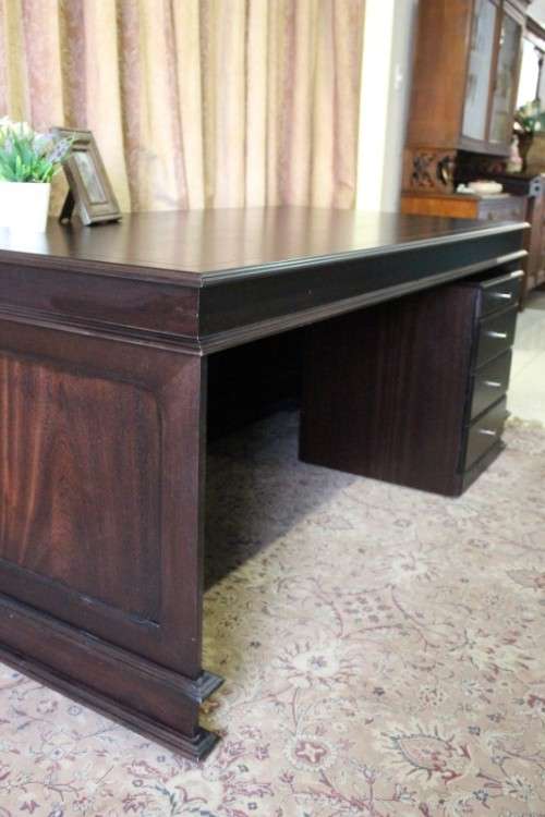 An amazing 'new" well made large darkened Oak executives desk with a 4 drawer removable pedestal