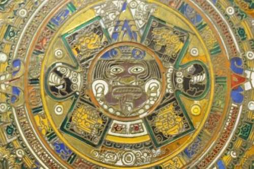 An awesome Mexican solid brass "Aztec/ Mayan" calendar display plate with enamelled detailing