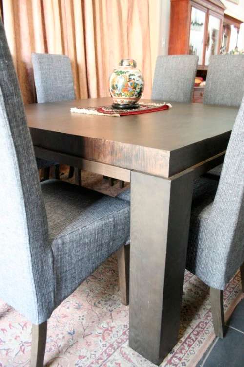 A stunning, new ultra modern 8 seater square dining room table w/ 8 high back upholstered chairs!