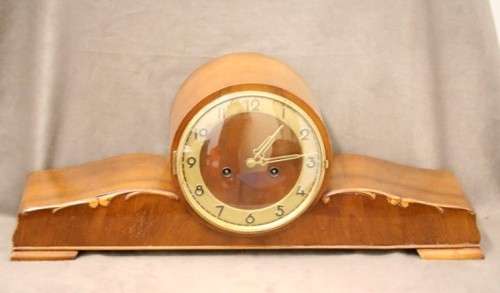 A gorgeous German made Art deco style "EMES" wind up gong chiming mantle clock in working condition.
