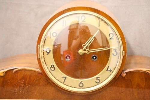 A gorgeous German made Art deco style "EMES" wind up gong chiming mantle clock in working condition.