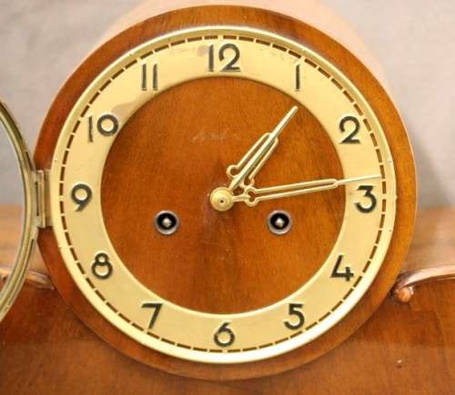 A gorgeous German made Art deco style "EMES" wind up gong chiming mantle clock in working condition.