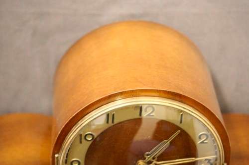 A gorgeous German made Art deco style "EMES" wind up gong chiming mantle clock in working condition.