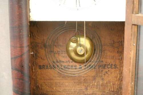 A fabulous antique American Waterbury Steeple pendulum clock in a Mahogany case