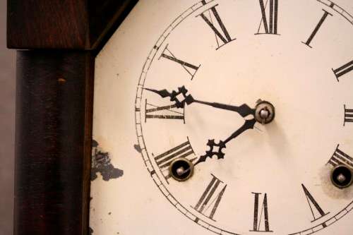 A fabulous antique American Waterbury Steeple pendulum clock in a Mahogany case