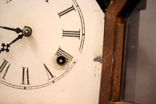 A fabulous antique American Waterbury Steeple pendulum clock in a Mahogany case