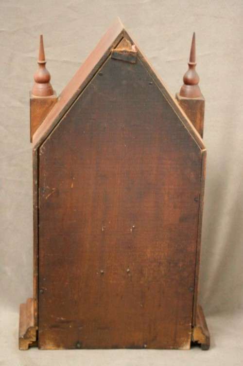 A fabulous antique American Waterbury Steeple pendulum clock in a Mahogany case
