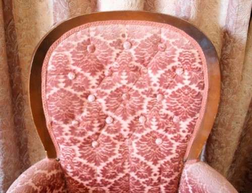 An elegant pair of vintage Queen Anne styled arm chairs w/ button detailing & gorgeous pink fabric.