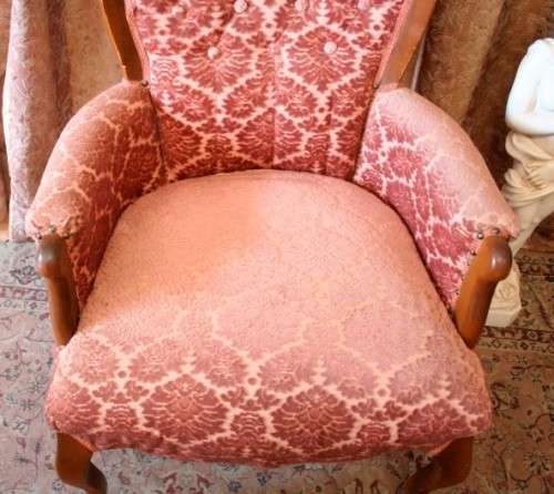An elegant pair of vintage Queen Anne styled arm chairs w/ button detailing & gorgeous pink fabric.