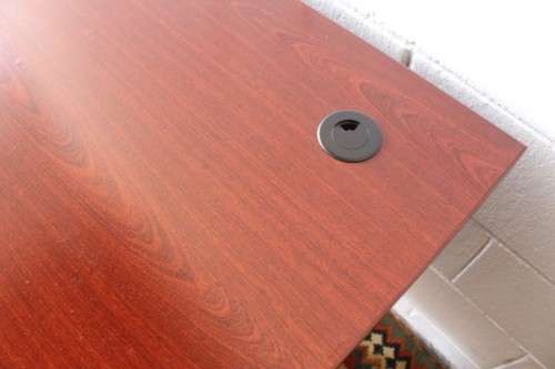 A lovely cherry-wood colour and black framed 120cm office/ study desk - perfect for a smaller space