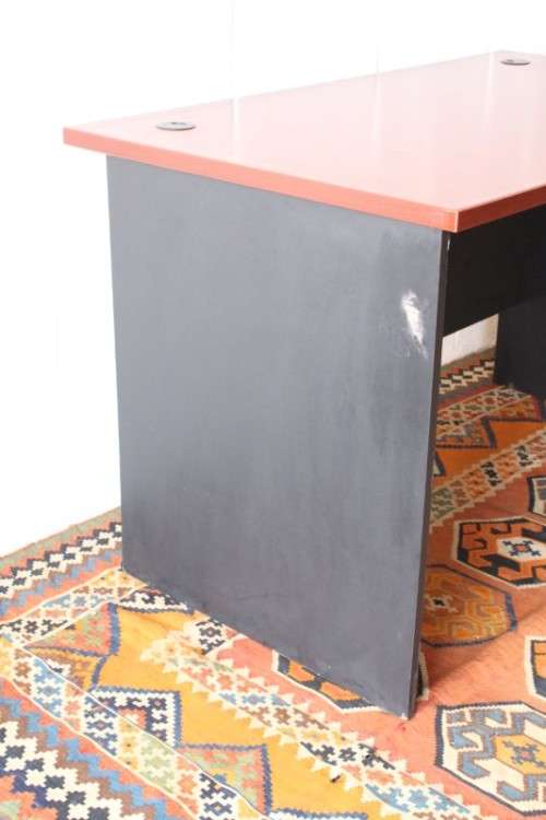 A lovely cherry-wood colour and black framed 120cm office/ study desk - perfect for a smaller space