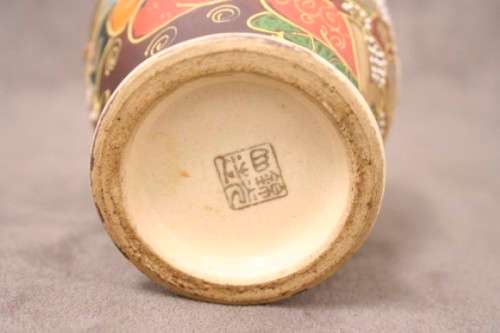 An incredible pair of Japanese Satsuma "Moriage Dragonware" porcelain vases with raised dragons
