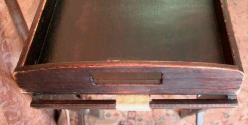 A lovely wooden butlers tray w/ removable tray, perfect for extra serving space around the house.