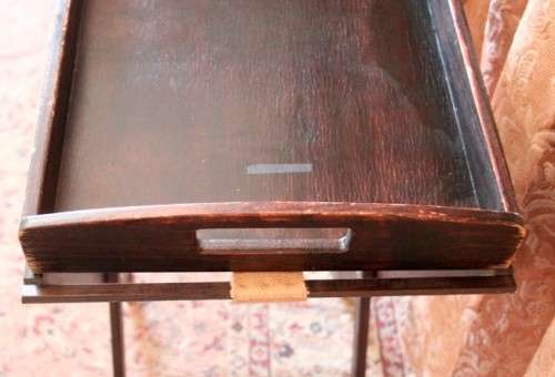 A lovely wooden butlers tray w/ removable tray, perfect for extra serving space around the house.