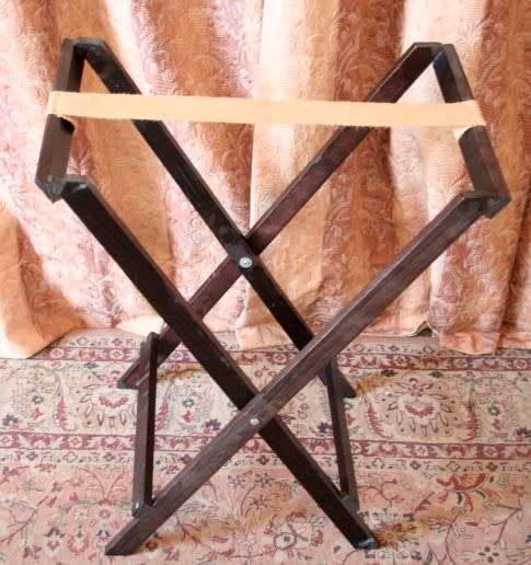 A lovely wooden butlers tray w/ removable tray, perfect for extra serving space around the house.