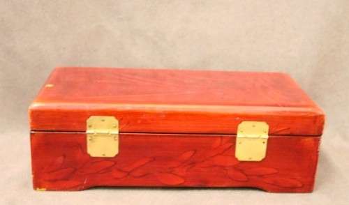 A beautifully made wooden Chinese jewellery box with brass latch and hinges.