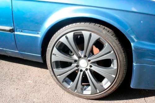 A highly collectible 1989 BMW (E30) converted to 325IS Coupe in metallic blue 90% restored.