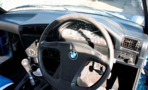 A highly collectible 1989 BMW (E30) converted to 325IS Coupe in metallic blue 90% restored.