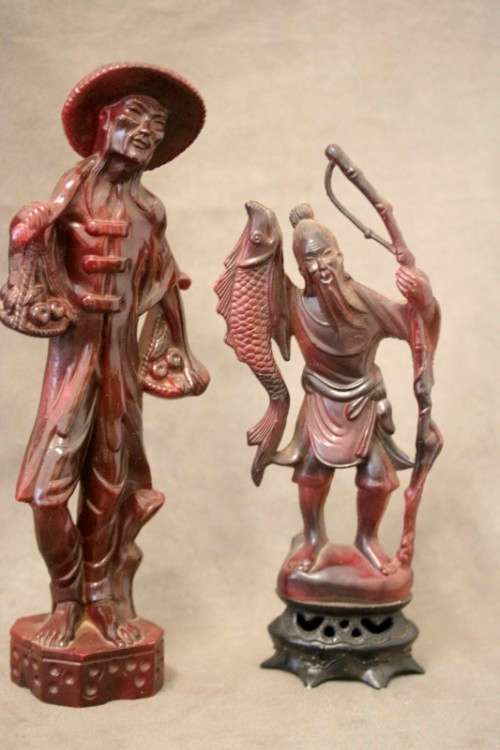 A pair of ornamental Chinese plastic figurines, a fisherman and veg seller, fabulous on display.