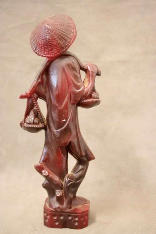 A pair of ornamental Chinese plastic figurines, a fisherman and veg seller, fabulous on display.