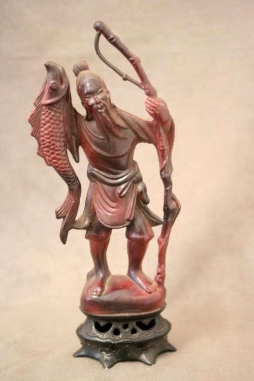 A pair of ornamental Chinese plastic figurines, a fisherman and veg seller, fabulous on display.
