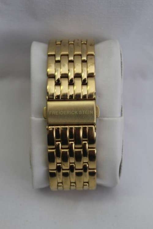 A classy original Frederick Stein "Excellence Diamond" gold plated gents wrist watch in its box
