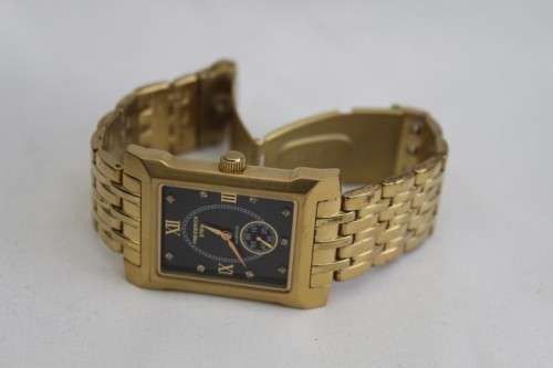A classy original Frederick Stein "Excellence Diamond" gold plated gents wrist watch in its box