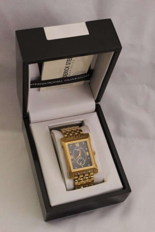 A classy original Frederick Stein "Excellence Diamond" gold plated gents wrist watch in its box