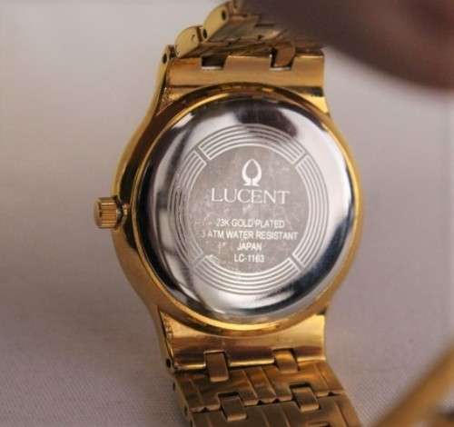 A fantastic 23k gold plated white-dial Lucent Diacoat quarts gents dress watch with spare links