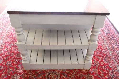 A stunning larger kitchen centre island with two large pot drawers, double-door cupboard & shelves