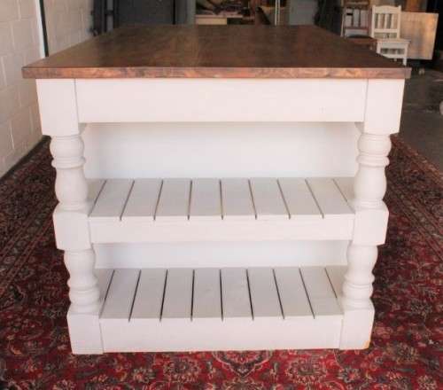 A stunning larger kitchen centre island with two large pot drawers, double-door cupboard & shelves