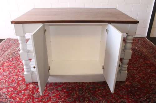 A stunning larger kitchen centre island with two large pot drawers, double-door cupboard & shelves