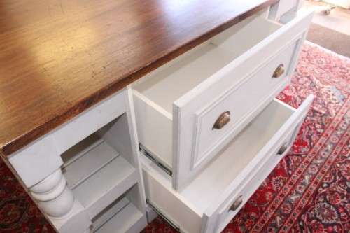 A stunning larger kitchen centre island with two large pot drawers, double-door cupboard & shelves
