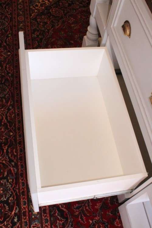 A stunning larger kitchen centre island with two large pot drawers, double-door cupboard & shelves