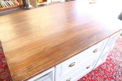 A stunning larger kitchen centre island with two large pot drawers, double-door cupboard & shelves