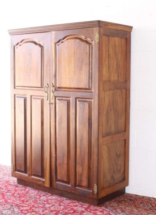 An awesome vintage solid Imbuia 2-door wardrobe with ample hanging space and packing space