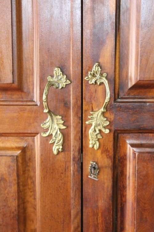 An awesome vintage solid Imbuia 2-door wardrobe with ample hanging space and packing space